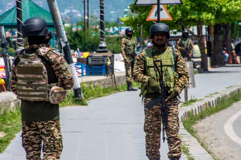 Indian soldiers stand guard on the bank of Dal lake following the deadly attack in Pahalgam [File: Getty]